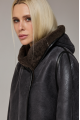 Short sheepskin coat with a hood made of natural sheepskin in graphite color